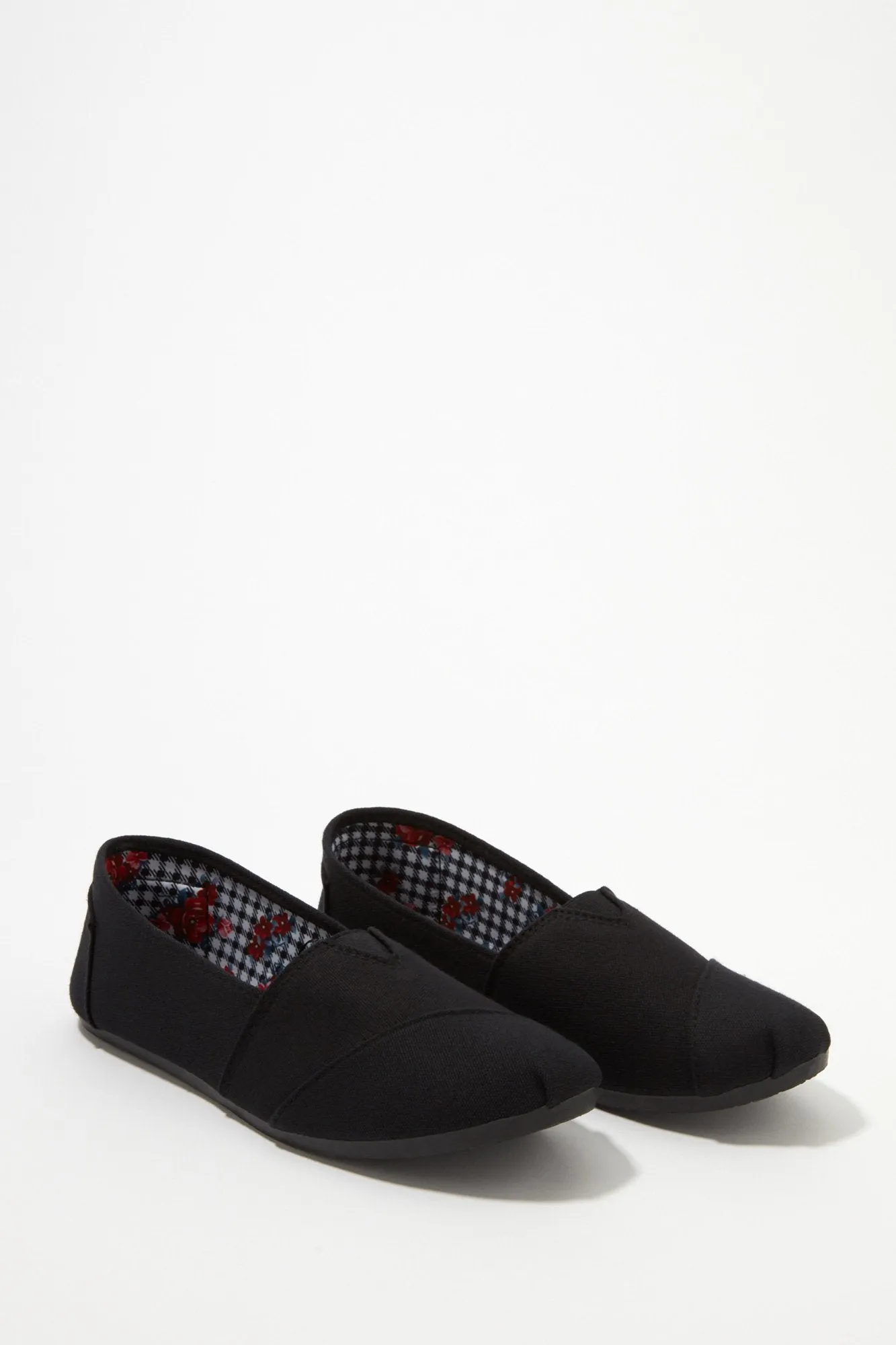 Black Sole Canvas Slip-On Sneakers