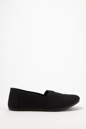 Black Sole Canvas Slip-On Sneakers